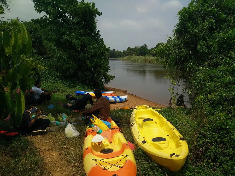 Kayaks beside the Kali River in Dandeli