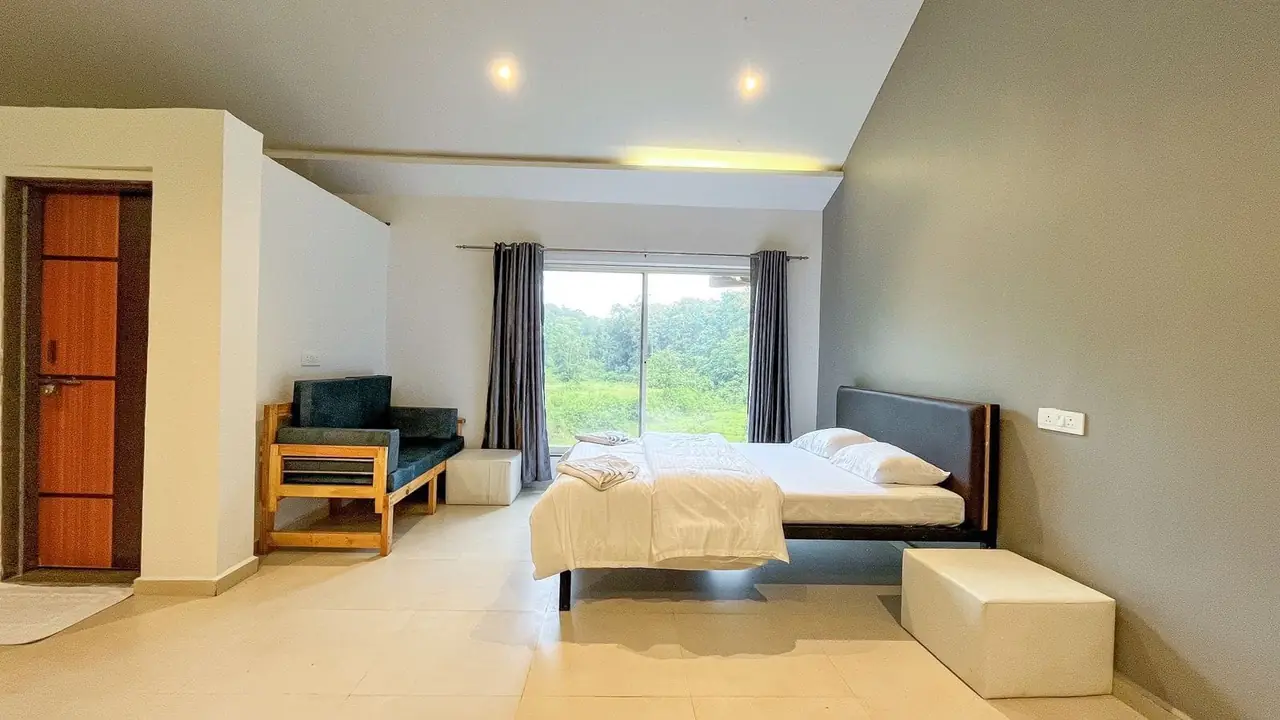 Deluxe room with forest-facing window