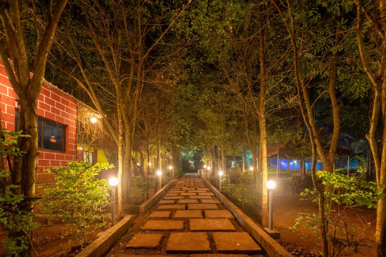 Lighted walkway in the resort at night